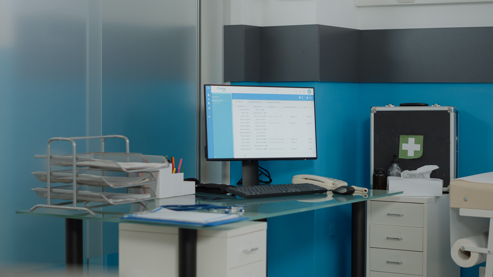 Illustration of an empty medical-clinic desk with a computer monitor, document files and clinical equipment.